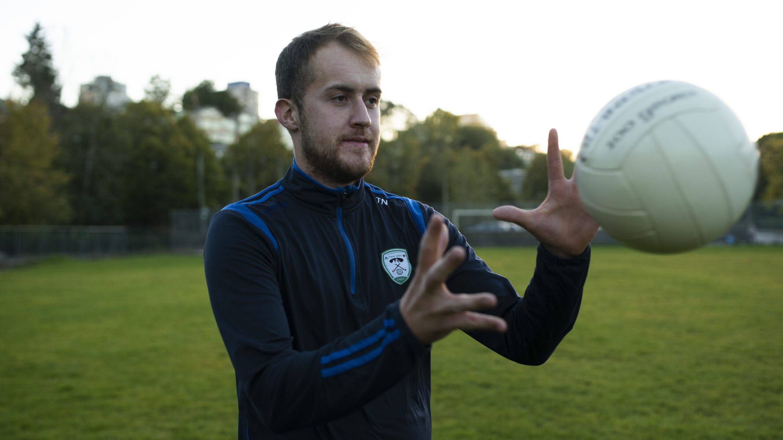 Tom Nicholson catching a Gaelic football.